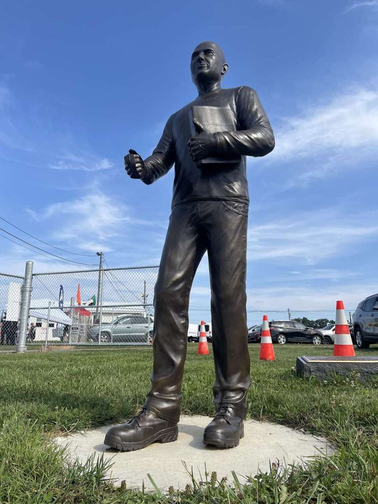Comperatore statue greets farm show goers